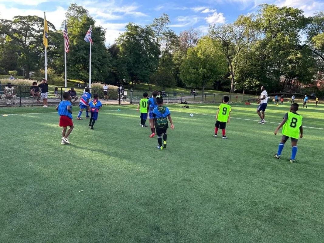 Youth soccer players participating in a community match